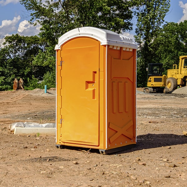 how often are the portable restrooms cleaned and serviced during a rental period in Everett MI